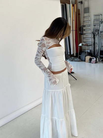 Top met Sierlijke Detailafwerking en Lange Mouwen